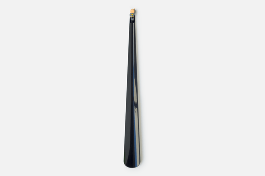 A long gloss black cape forms the functional part of the shoehorn design, whilst a minature superhero is affixed to the top to add wit and delight to the user experience