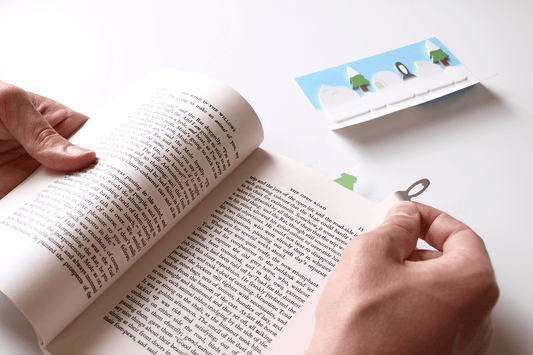 Polar Sticky Page Markers being stuck in a book to mark a page