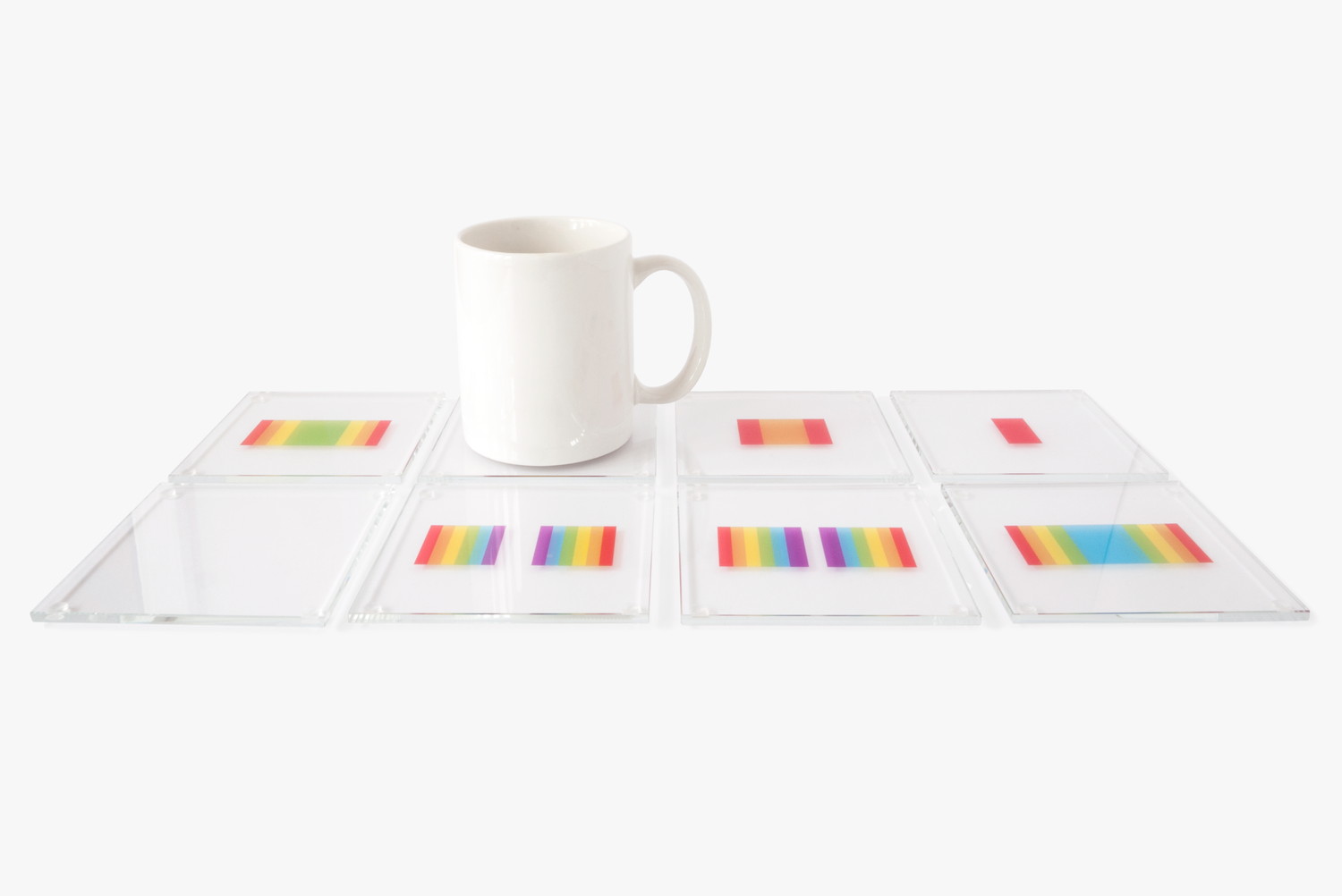 creative designer rainbow coasters all arranged uniformly on a flat surface