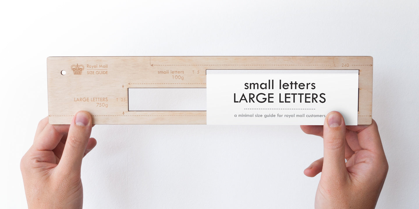 birth ply wooden size guide for postal mail with laser cut holes and laser etched markings to show which packages will be defined as small letters, LARGE LETTERS or parcels otherwise