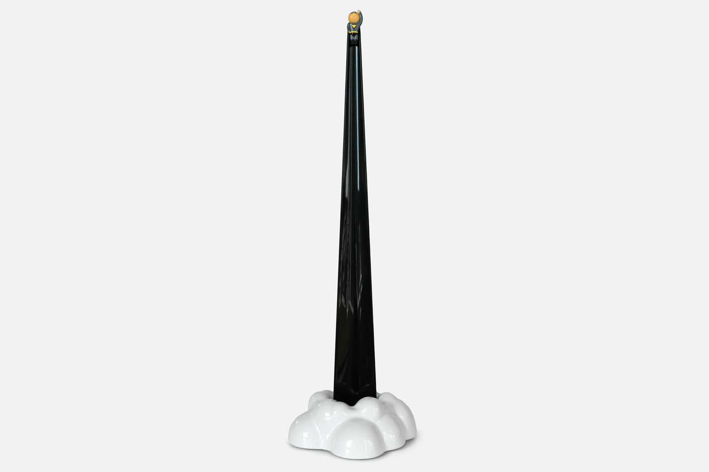 Shoeperhero (Black) by Duncan Shotton Design Studio shows shoehorn sitting in it's stand as if bursting from a cloud of smoke