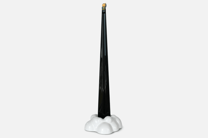 Shoeperhero (Black) by Duncan Shotton Design Studio shows shoehorn sitting in it's stand as if bursting from a cloud of smoke