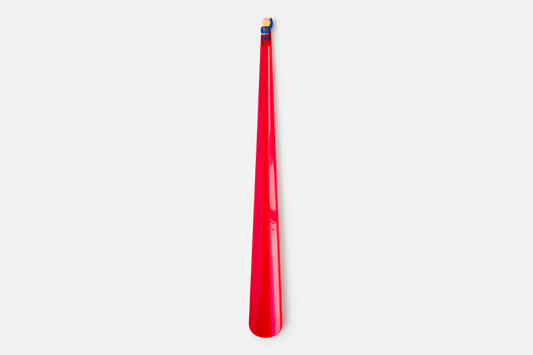 A long red cape forms the functional part of the shoehorn design, whilst a minature superhero is affixed to the top to add humor and delight to the user experience